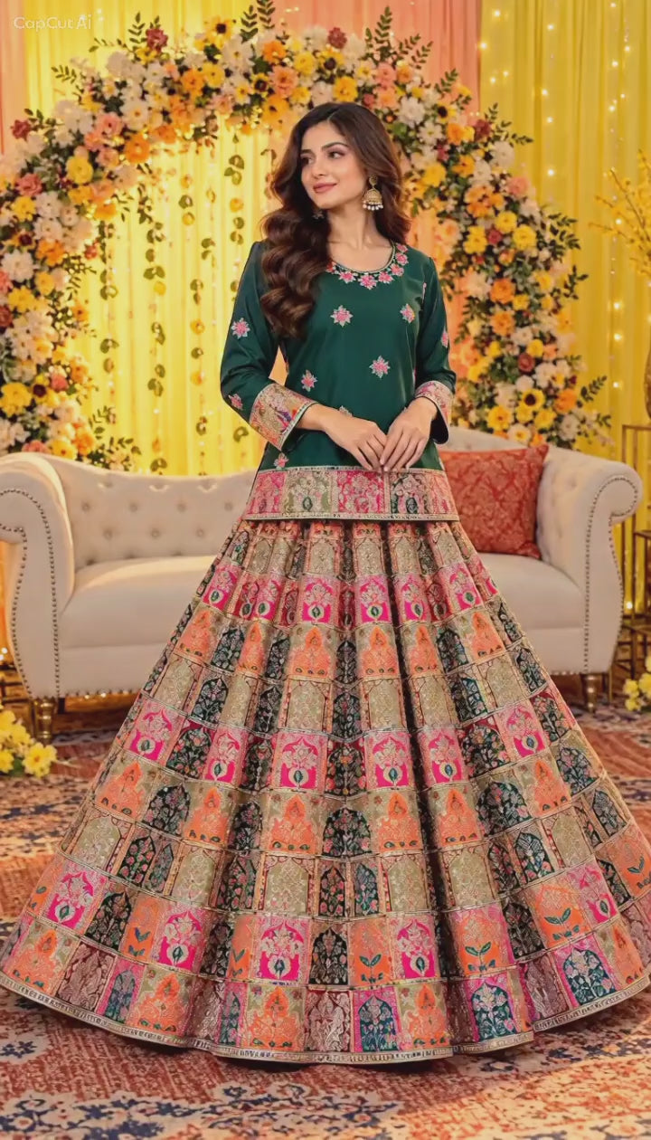 Video of emerald green embroidered short shirt with multicolor lehenga by Ruhaan Fabric